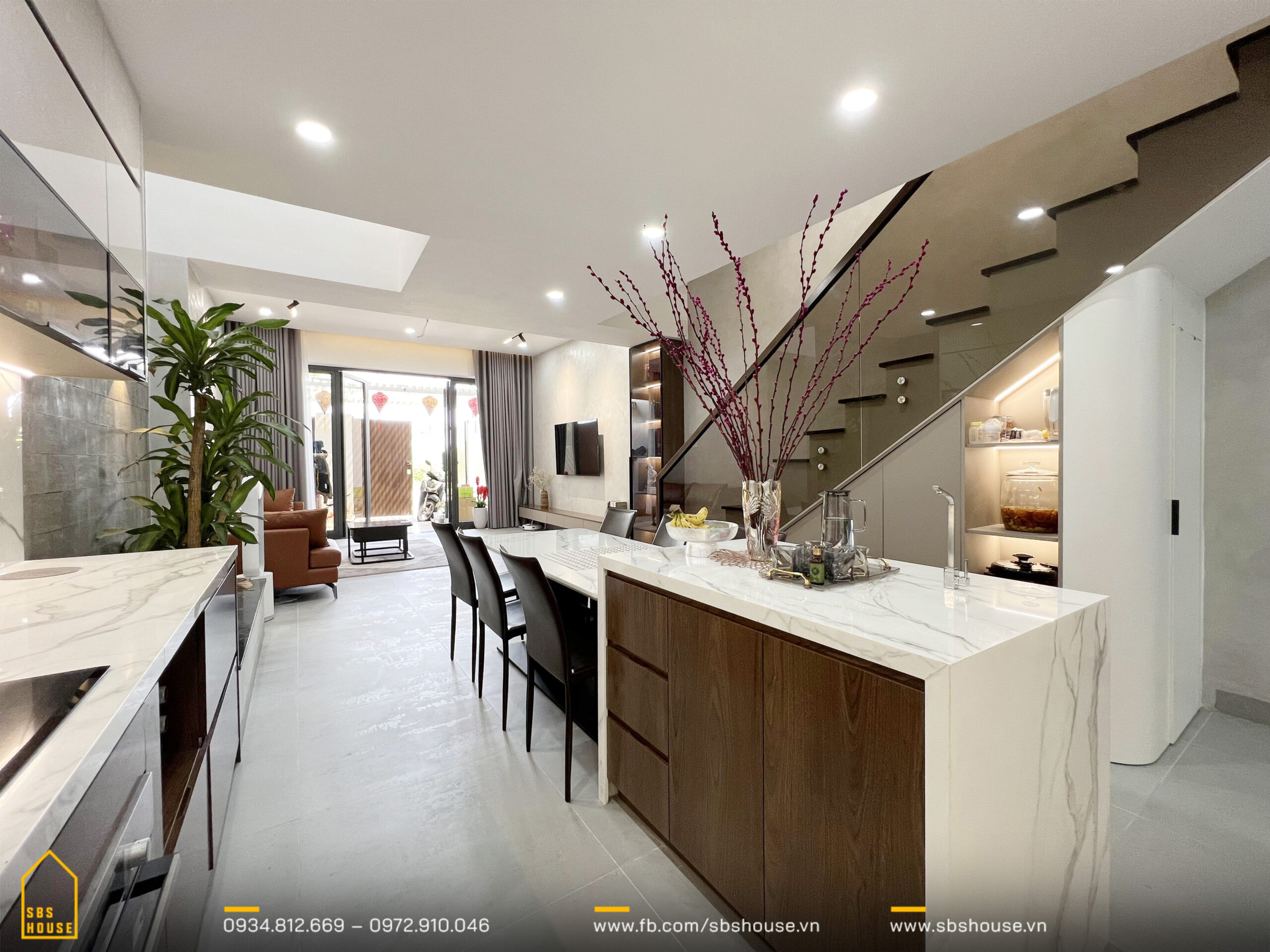 Đ's house - Sự liên kết giữa phòng bếp và phòng khách giúp không gian khu vực này thêm phần thông thoáng, thuận tiện cho sự di chuyển. 