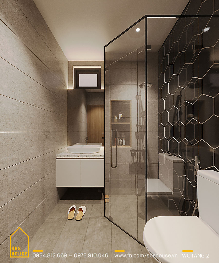 Phòng WC sang trọng và sạch sẽ với đá ốp toàn bộ, sử dụng vách kính giúp không gian mở rộng hơn.