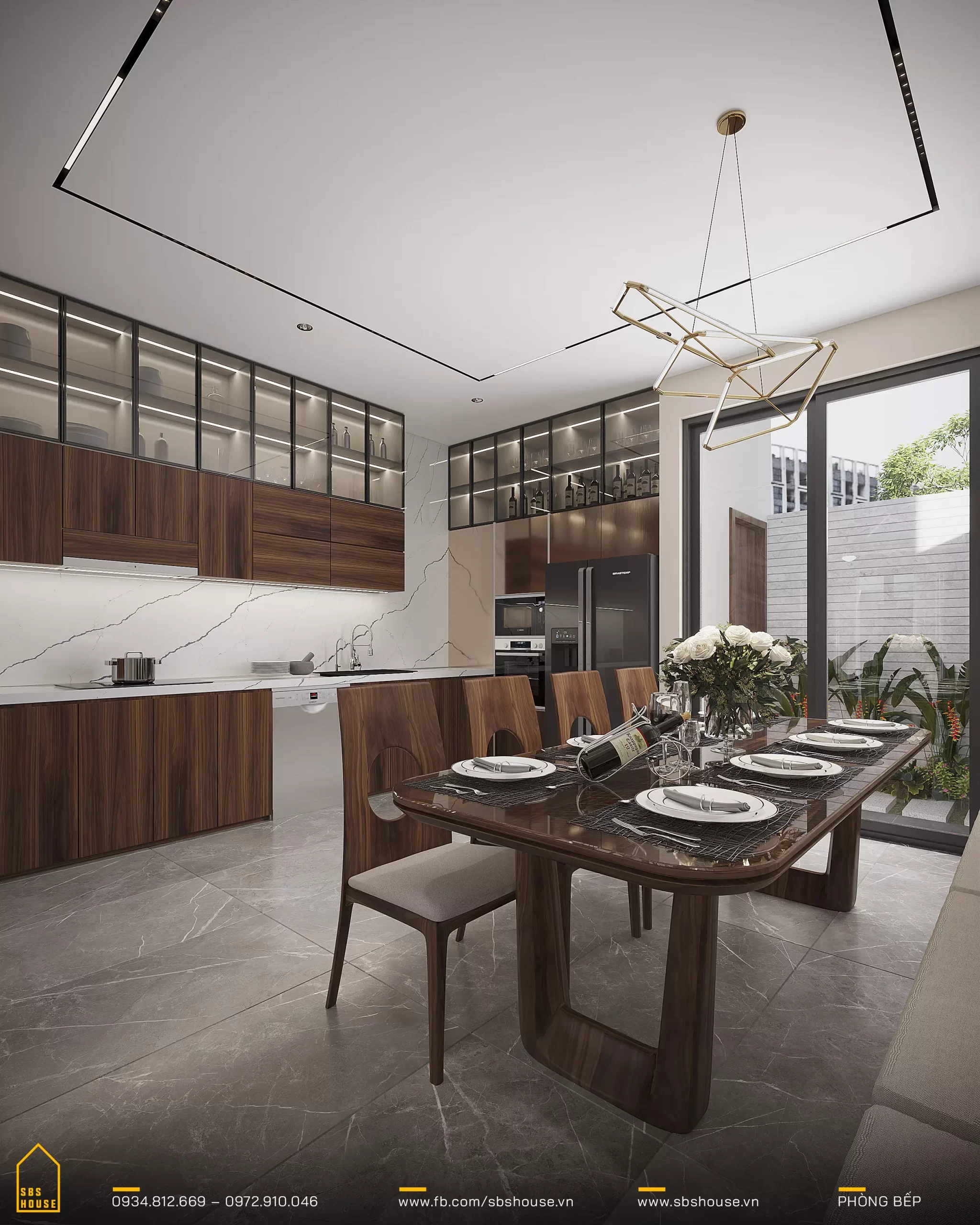 Phòng bếp ấn tượng với các thiết bị hiện đại, bàn ăn lớn và tông màu trắng tạo cảm giác thoải mái và sáng sủa. 