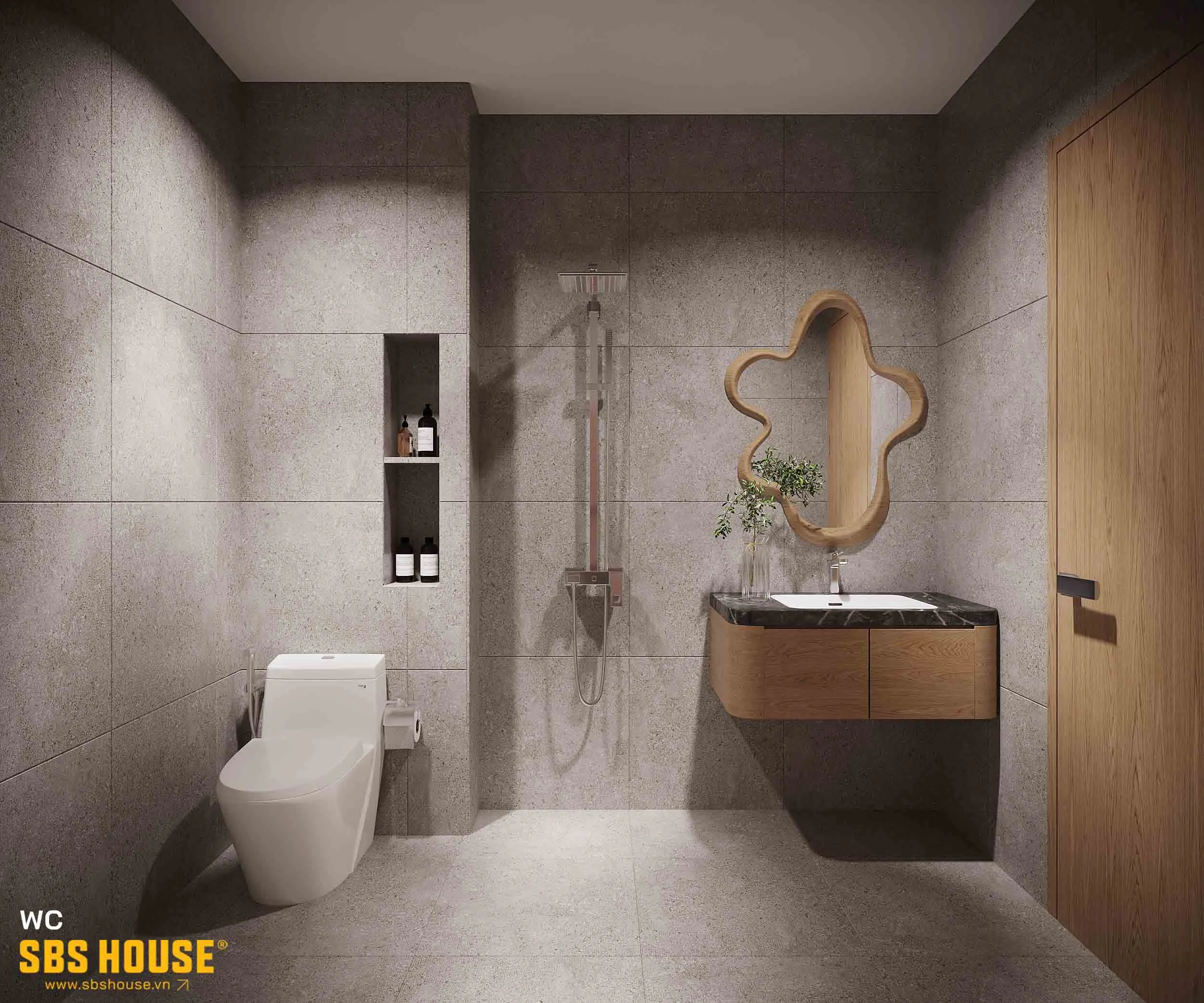 Phòng WC với tone màu xám hiện đại. Các khu vực được bố trí khéo léo để đáp ứng tốt nhu cầu sử dụng của gia chủ. Điểm nhấn là chiếc gương treo tường với kiểu dáng cách điệu, vừa nghệ thuật vừa hiện đại
